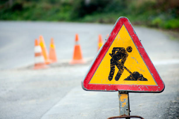 Road works ahead, traffic cones, copy space on the left. Galicia, Spain.